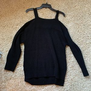 Lightly worn, open shoulder black sweater